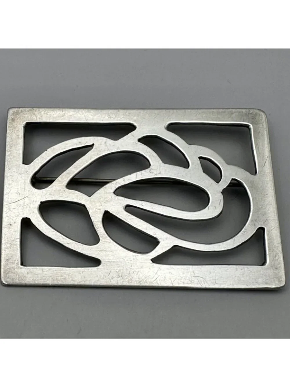 Modernist Cut Out Scrolls Brooch Signed John Bryan Sterling Silver Hand Wrought